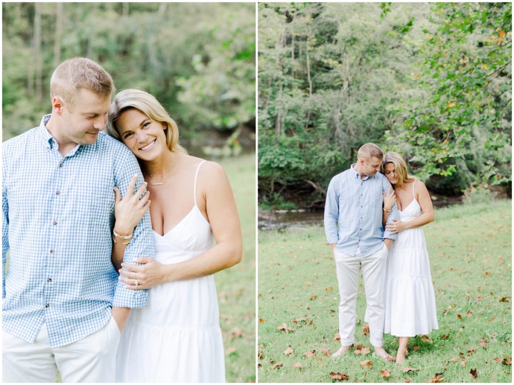 couple posing by a river for their engagement session