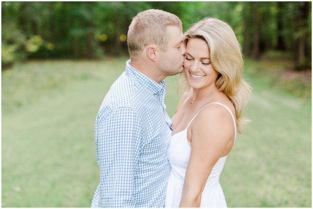 couple posing for their chagrin falls engagement session