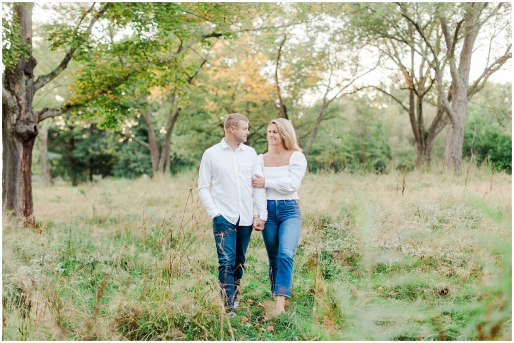 couple posing for their chagrin falls engagement session