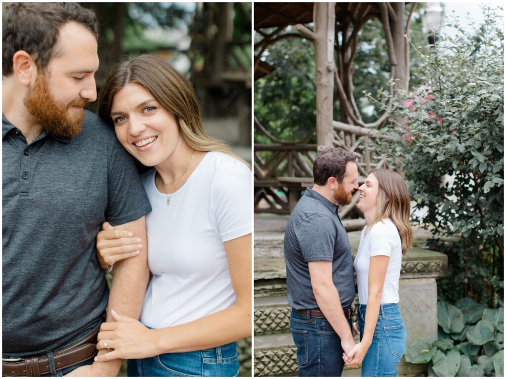 An engaged couple looking at each other and smiling during their downtown chagrin falls engagement session