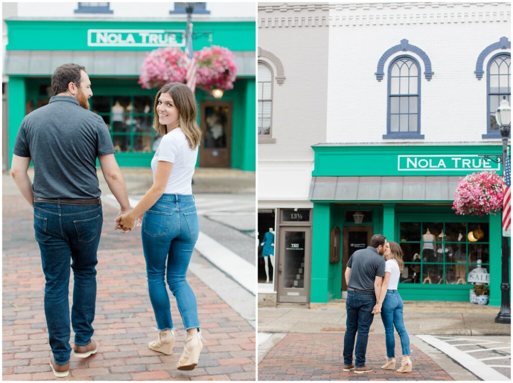 a couple kissing in the middle of the street in downtown chagrin falls