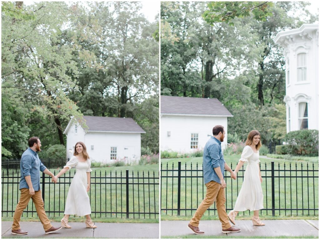 a couple walking on the sidewalk through chagrin falls for their engagement session