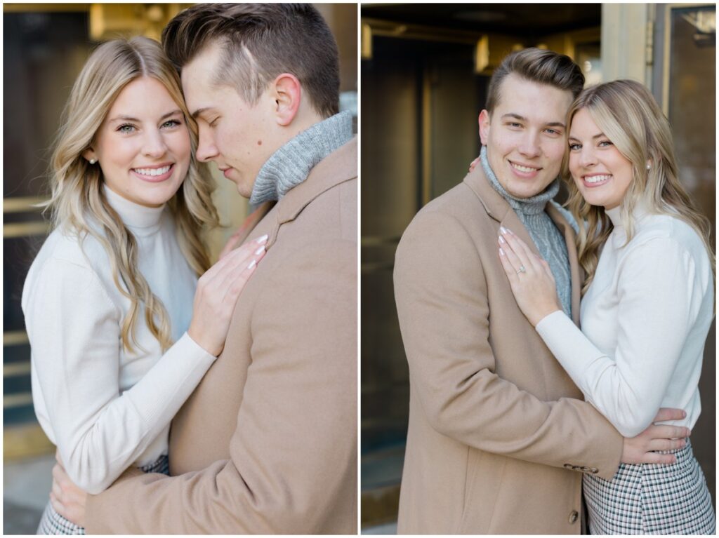 An engaged couple posing outside Terminal Tower in Cleveland Ohio for their engagement session