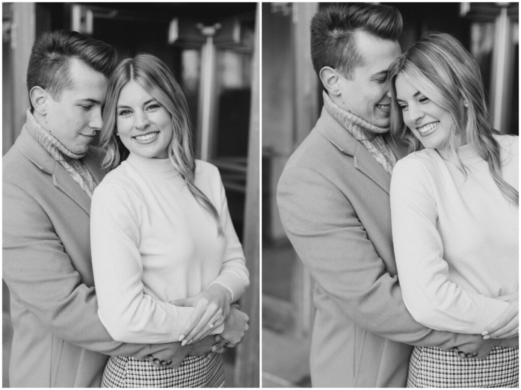 An engaged couple posing outside Terminal Tower in Cleveland Ohio for their engagement session