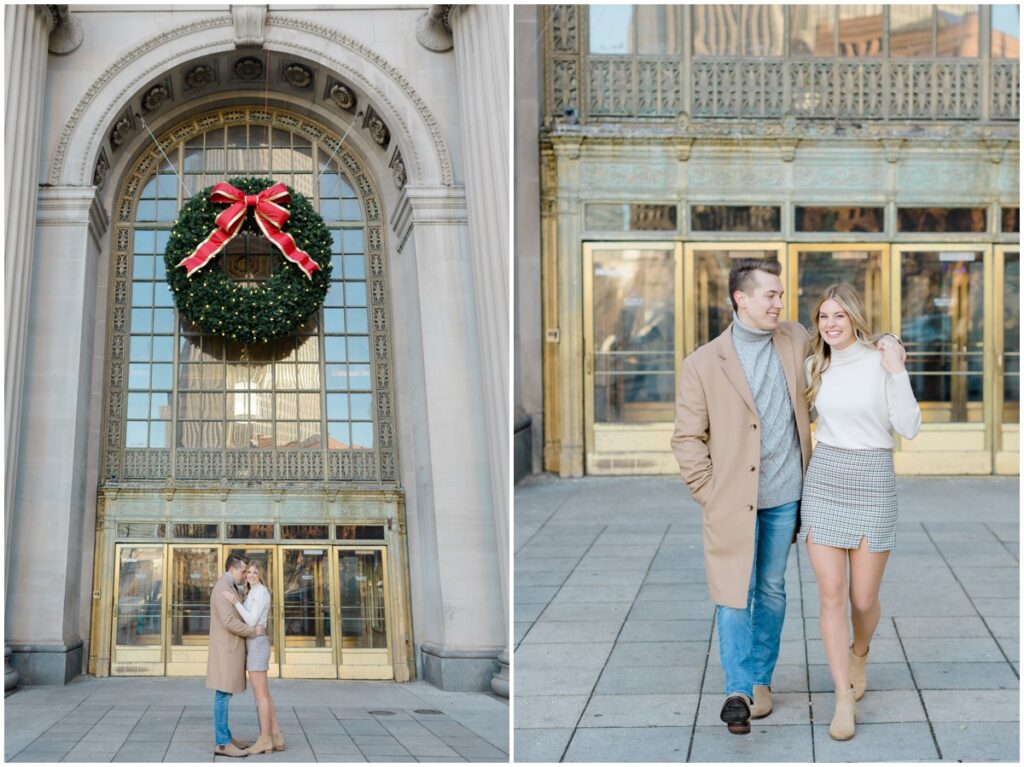 An engaged couple posing outside Terminal Tower in Cleveland Ohio for their engagement session