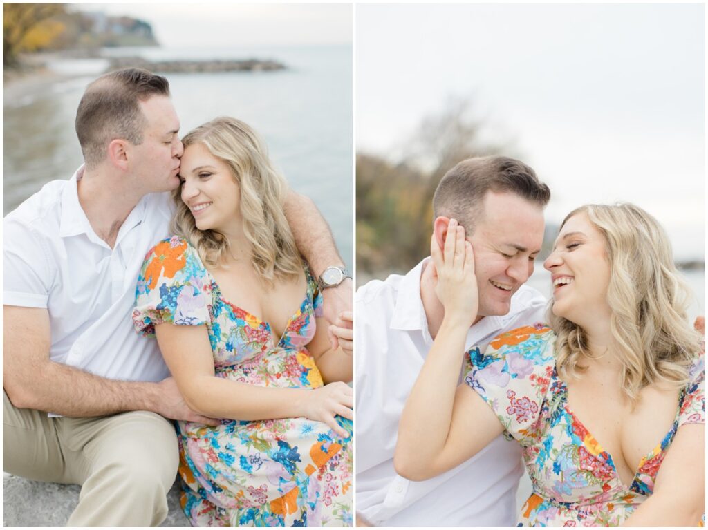 An engaged couple posing at Edgewater park for their engagement session