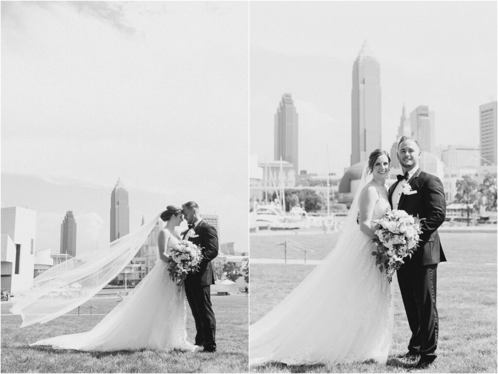 A couple posing in Voinovich park in cleveland ohio for their wedding photos.