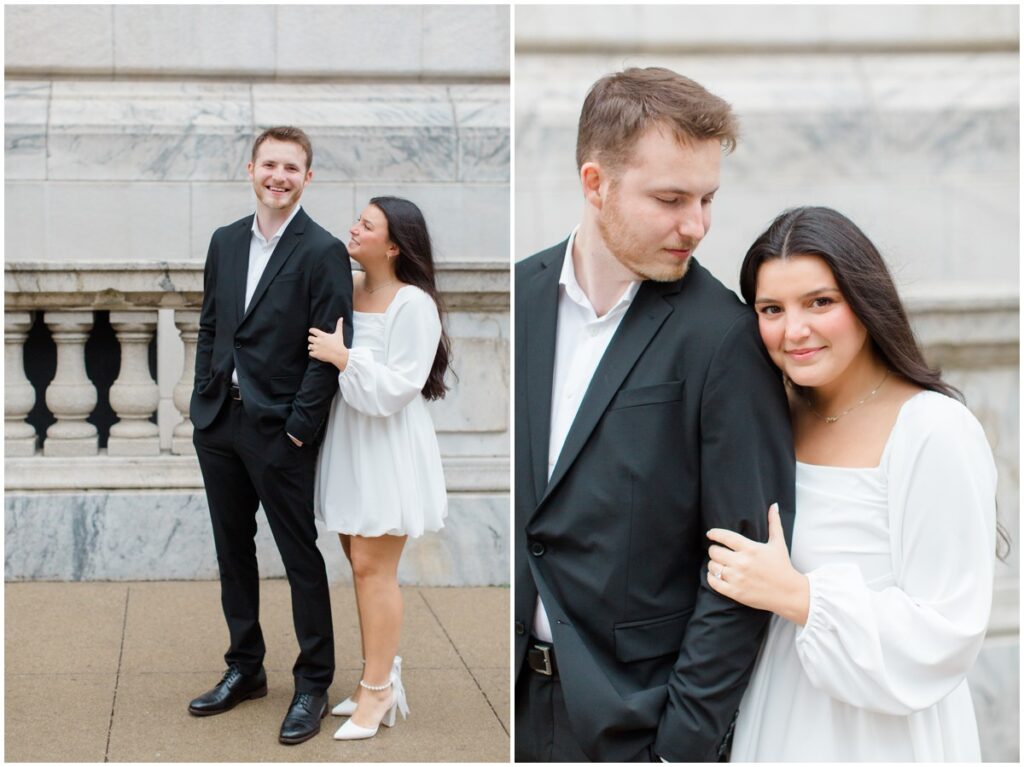 A couple embracing each other in front of the Cleveland Public Library during their engagement session in Cleveland, Ohio.