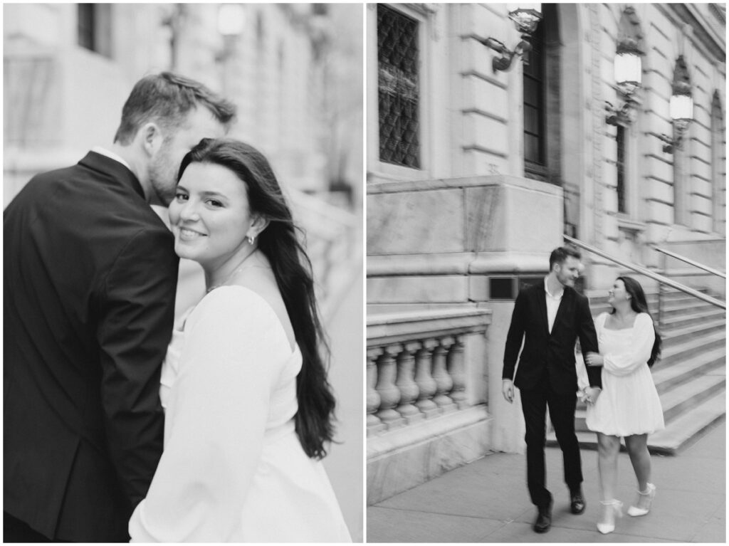 a couple holding hands and walking for their engagement session photos in front of the Cleveland Public Library