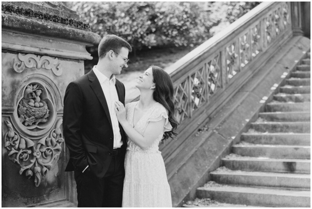 A couple posting for their New York City engagement session in Central Park