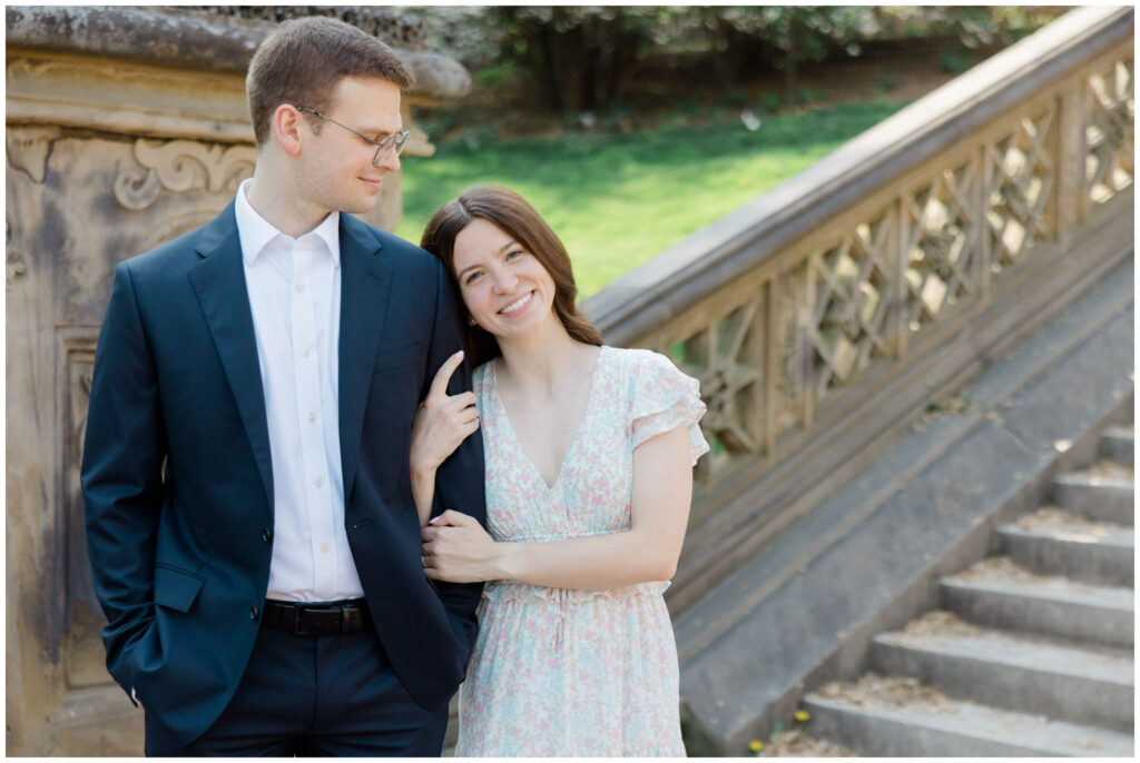 A couple posting for their New York City engagement session in Central Park
